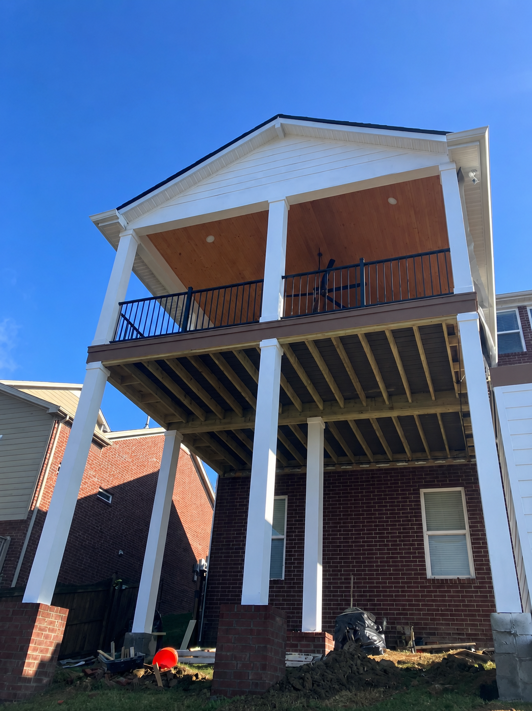 Two-story covered porch construction in progress