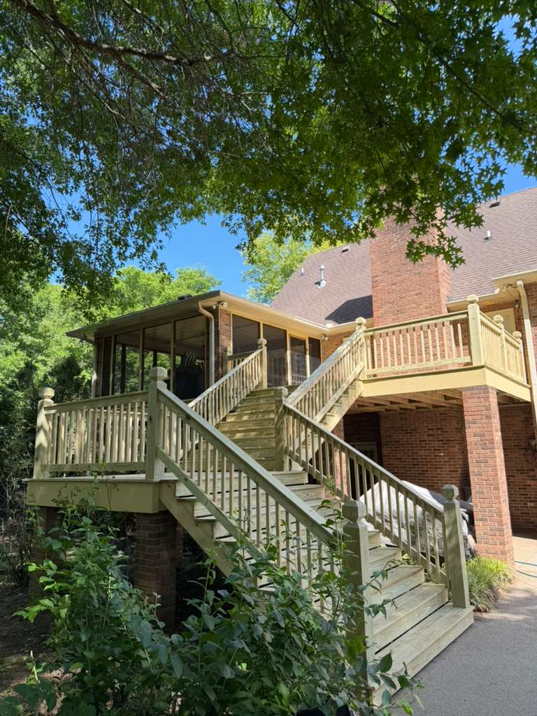 Wood deck with multi-level stairs and railings