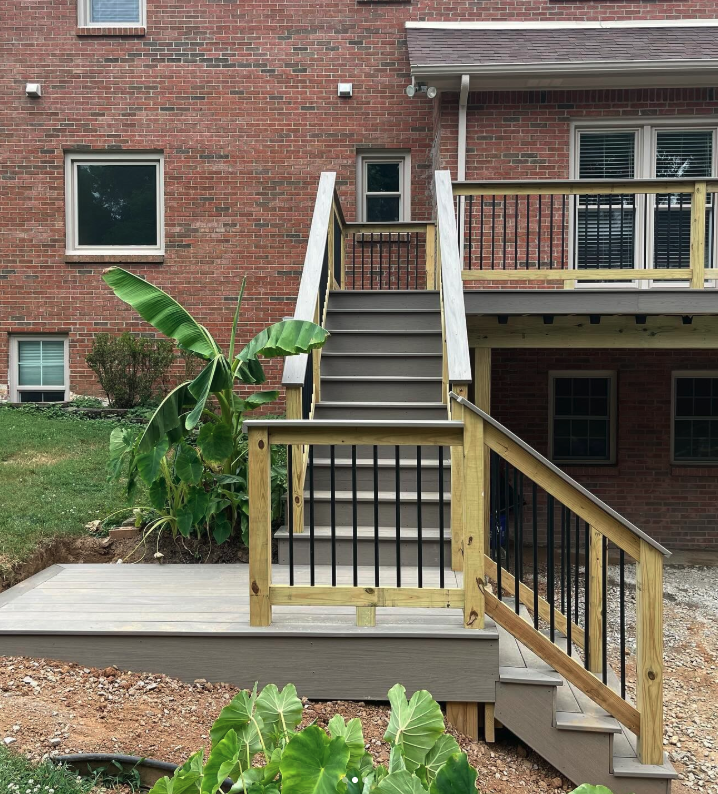 Deck with stairs and gray composite decking