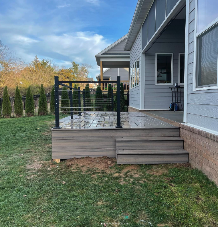 Low composite deck with black cable railing
